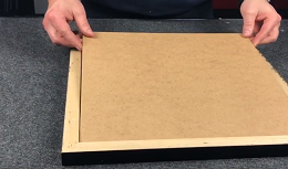 Backing board into picture frame