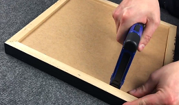 Sealing a picture frame with a point driver